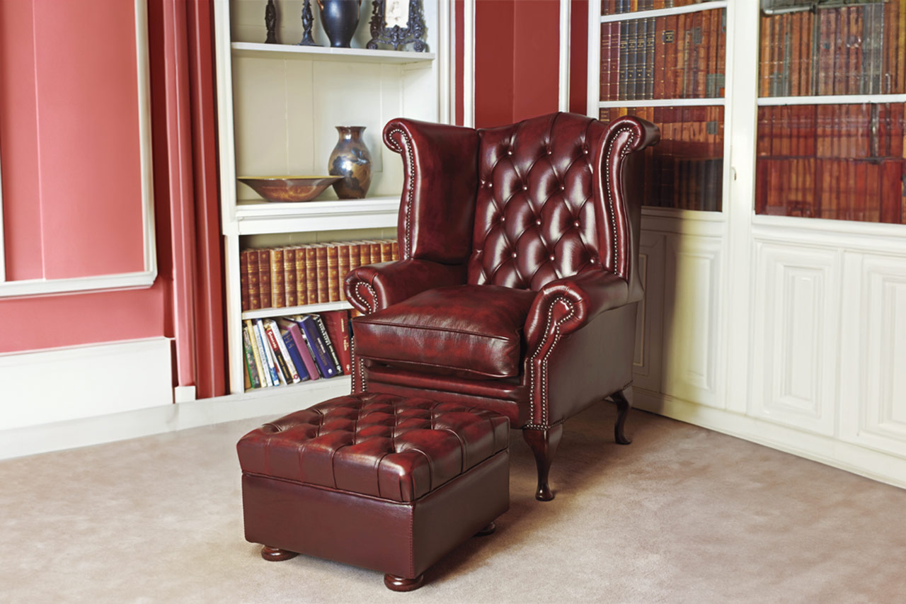 Graham compact antiqued leather traditional wingback chair with refined classic proportions