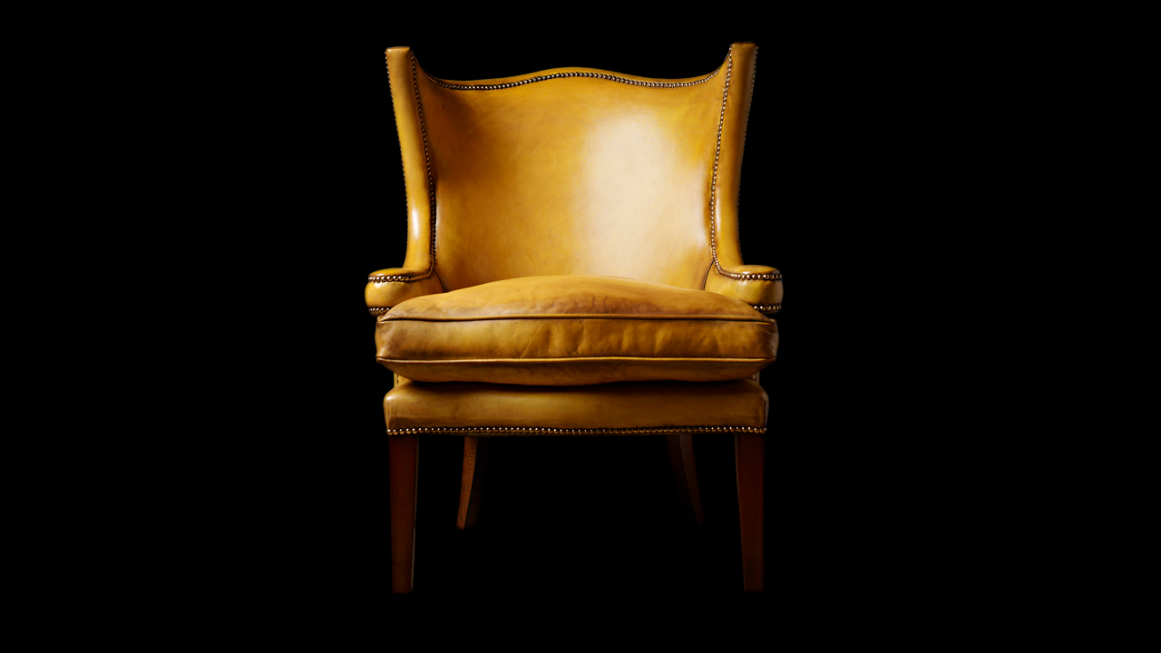 Jonathan Swift Sillón orejero dorado
