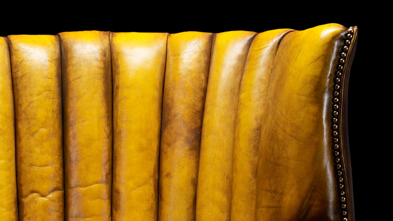 Fauteuil en cuir jaune Oliver Goldsmith