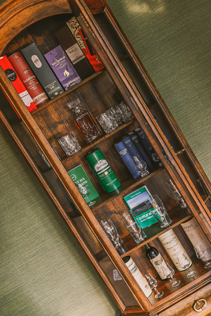 Mrs.  Schutz wooden drinks cabinet