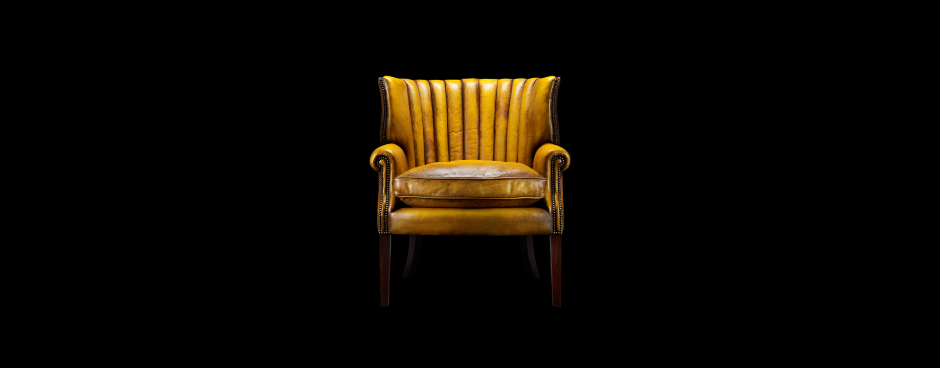 Oliver Goldsmith luxurious fluted wingback chair celebrating bold form and confident presence