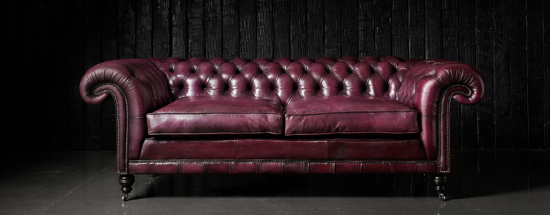 Samuel Johnson grand hand coloured leather tufted sofa