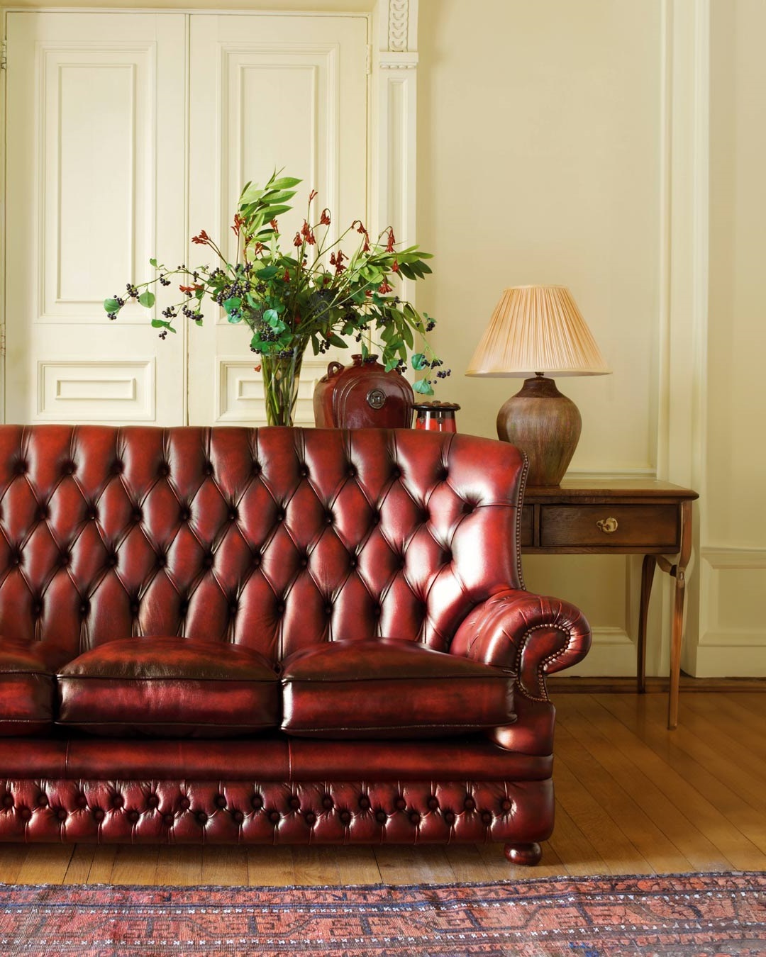 Howland 3 seater antiqued leather chesterfield sofa
