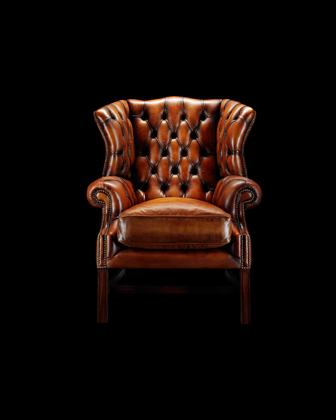 Samuel Johnson traditioneller Chesterfield-Sessel mit sorgfältiger Knopfheftung.